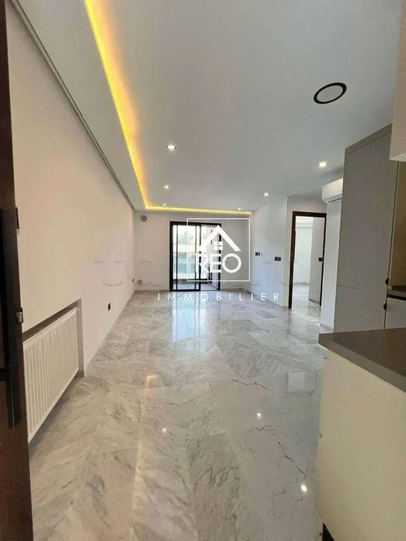 À Louer : Un appartement S+2 ( Jamais Habité)  idéalement situé à La  Soukra